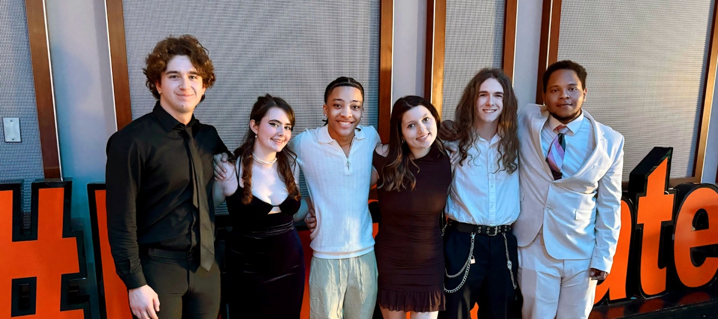 Group of students arm-in-arm